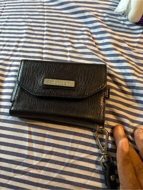 Calvin Klein Black Leather Wristlet Wallet with Silver Plaque